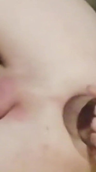 Skinny young man swallows his own urine and opens his ass wide