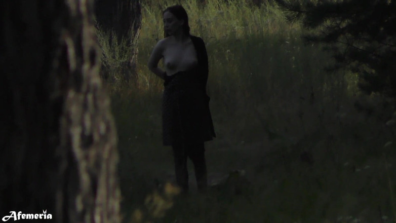 Afemeria: Lustful brunette undresses in the woods and walks naked