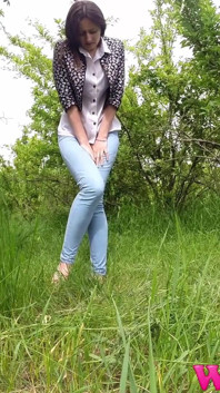 Desperate Skinny Girl in Jeans Trying to Hold Her Pee in the Forest