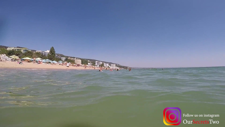 Our Secrets: She jerks him under the water on a beach full...