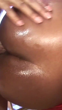 An oiled ebony chick with big ass fucked from BBC dude