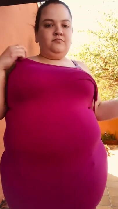 Big titty brunette: Big titty strip tease