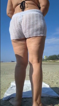 Hot Crown Sunbathing on the Beach in Transparent Micro Bikini