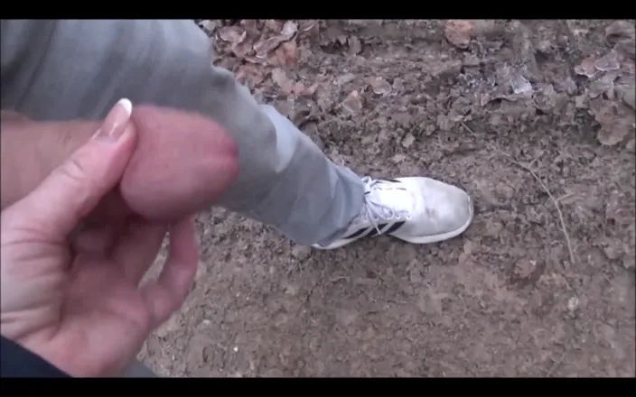 Asia: Forest walk handjob in close up