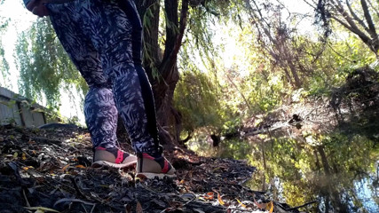 Elena: BBW in leggings pissing by the lake in a park