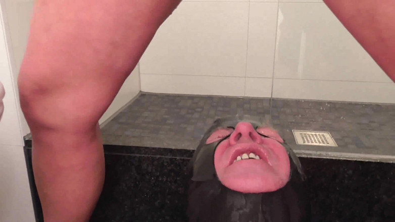 Femdom Austria: Golden Shower in Masked Face and Mouth