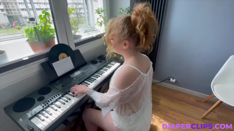 Nicole White: Playing on Keyboard.