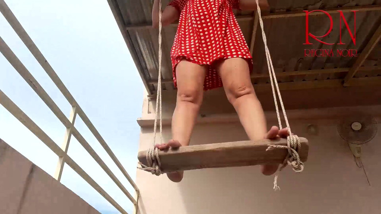Regina Noir: Depraved Housewife Swinging on a Swing Outdoors