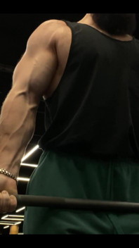 Doing a Biceps Curls with a Straight Barbell