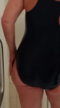 Grandma in a Tight Swimsuit Taking a Shower!