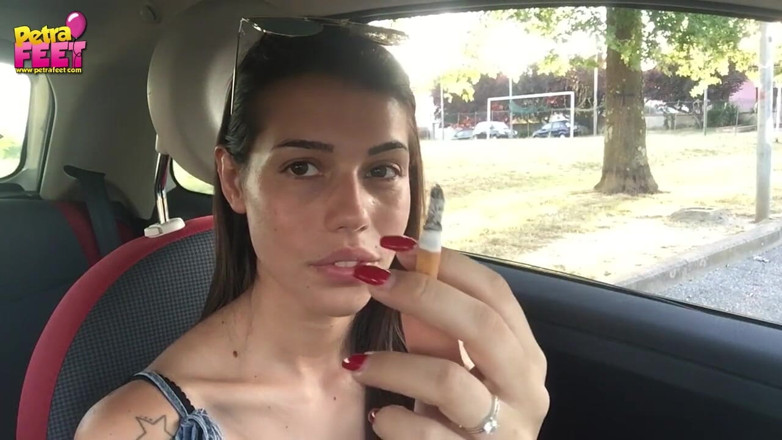 Smokin Fetish: Cute teen Petra smoking in the car