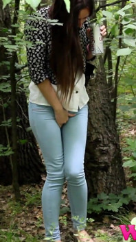Skinny Brunette in the Woods Desperate to Pee Wet Her Pants