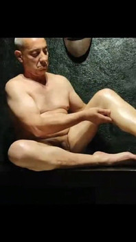 Tuga Male Passes Oil on His Legs