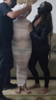 Mummifying Natasha with White Tape!