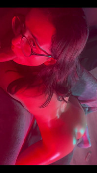 Sucking Dick While I Have a Toy Inside Me with Red and Blue Lighting