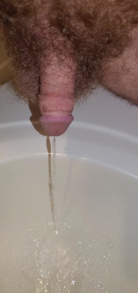 Closeup of My Cock Peeing in the Sink 1