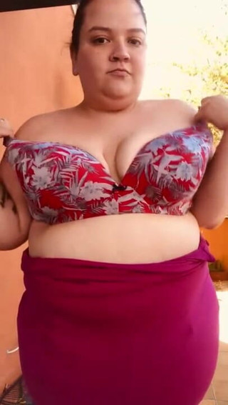 Big titty brunette: Big titty strip tease