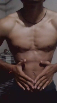 A Muscular Teen Boy Show His Body
