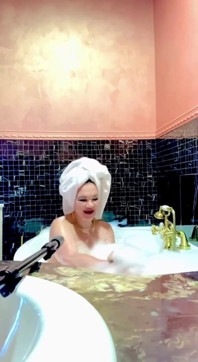 Stepmom Takes a Bath and Plays with Her Big Tits