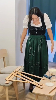 Austrian Woman in Dirndl Getting Dirty