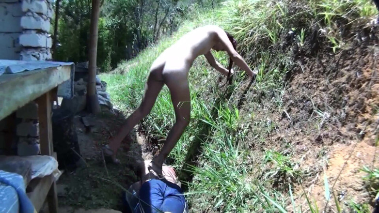 Femdom Austria: Nude babe stomping her slave in the backyard