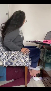 Kiffa Uses Slave as Footstool as She Uses Her Notebook