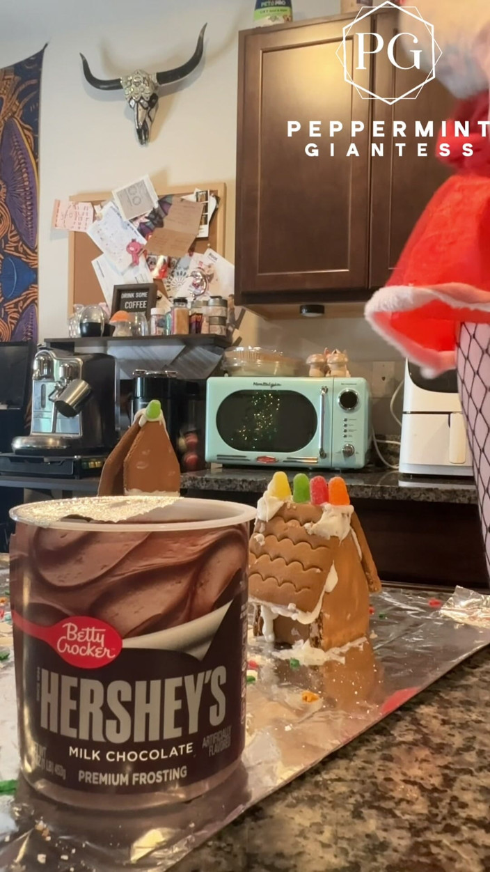 Peppermint Giantess: 73 Giantess in 8-inch Heels Decorates a Gingerbread Village