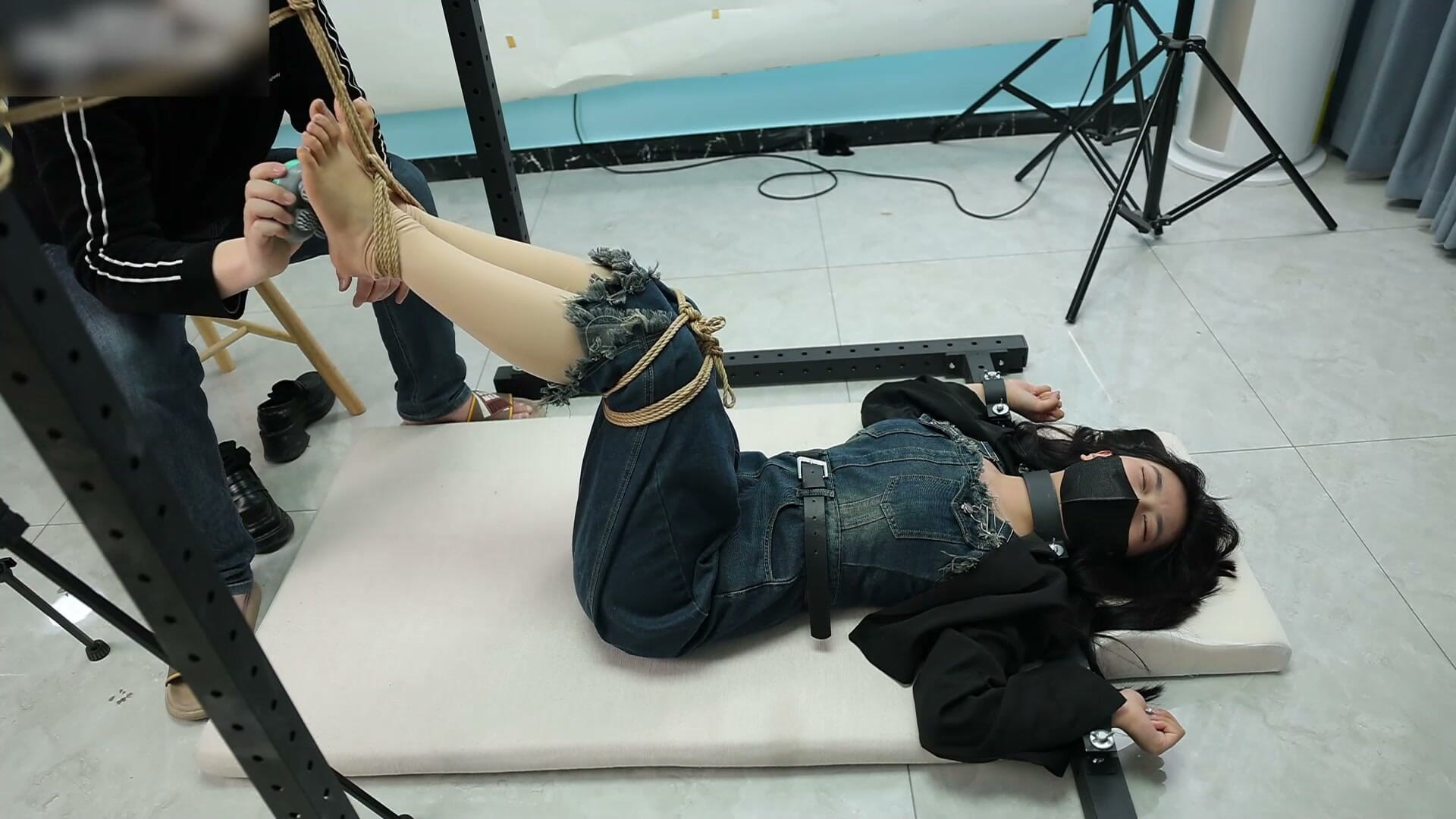 My Girlfriend Was Tied to an Iron Frame, Her Bare Feet Suspended and Tickled