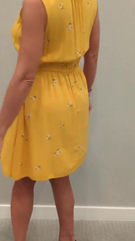 Stella in a Yellow Sun Dress with Black Heels