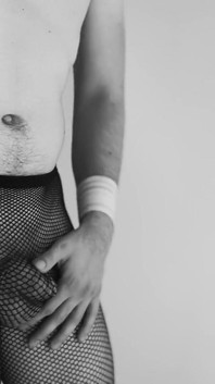 Sexy teen boy dances with only fishnets tease