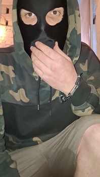 A Man in a Mask and a Cock