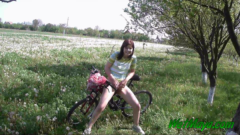 Wet Maya: Peeing on her bicycle