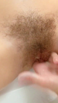 Two horny ginger teens masturbate their tight pussies in the bathtub