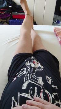 Nylonjunge in the Nightgown and Tights in Bed