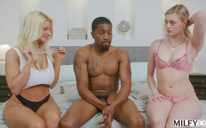 Milfy: Milf učitelka pohltí velké černé péro svého studenta v sexy trojce