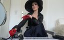 Lady Victoria Valente: Une femme élégante à chapeaux