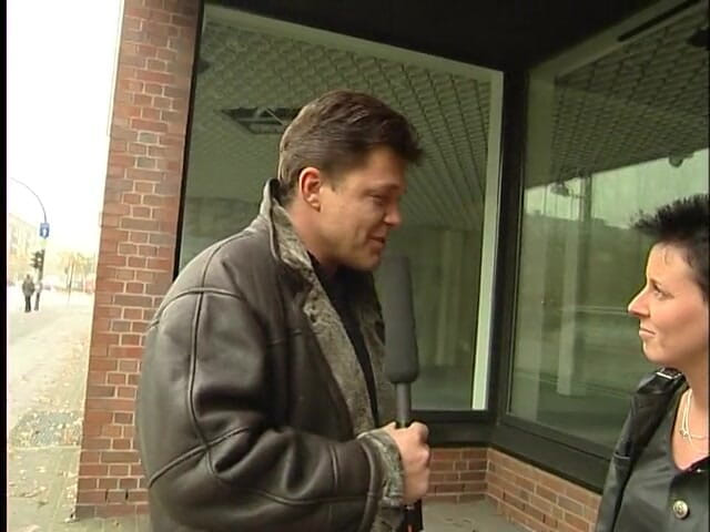 Lucky Cooch: A short-haired German girl was interviewed outdoor.