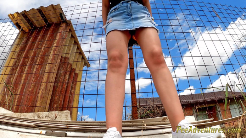 Pee Adventures: Sexy brunette trying hard to pee
