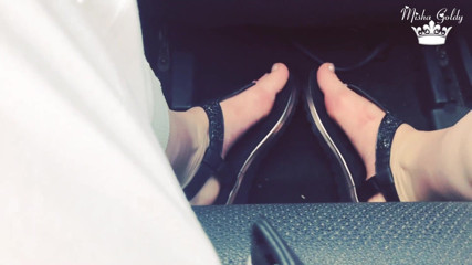 Goddess Misha Goldy: Feet tease in mustang cabriolet
