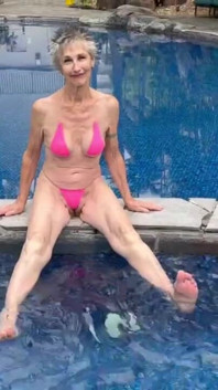 By the Hotel Pool in My Skimpy Pink Bikini