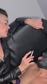 A Human Ashtray for Leather Mistress