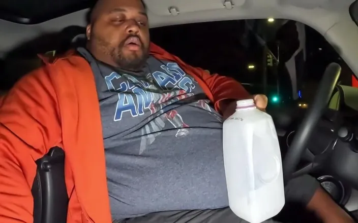 Blkhole420: Fat guy in a little car and chugging some half...