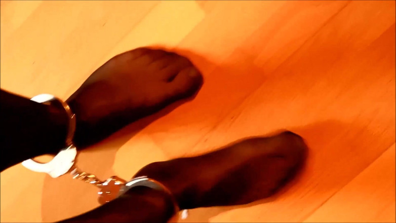 Crossdresser Violeta: Nylon feet shackled - Crossdresser pantyhose feet and legirons