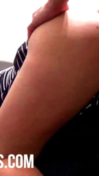 Hot Brunette in a Dress Sitting