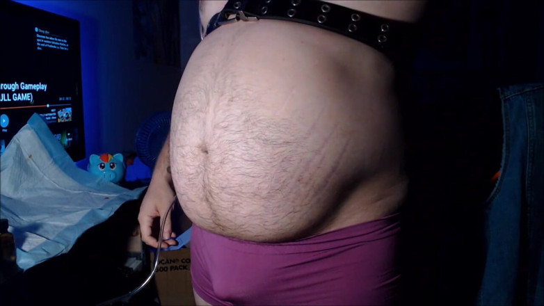 Akevantelico91: Belly inflation in purple boyshorts