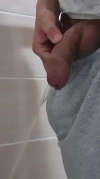 Guy Long Pissing with Uncircumcised Cock and Big Balls