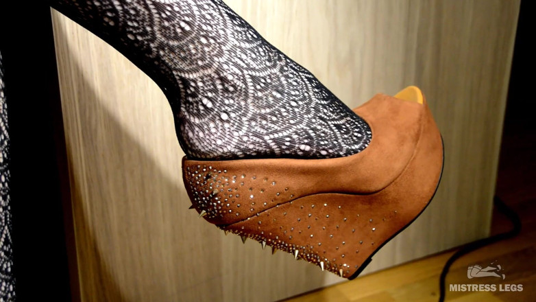 Mistress Legs: My lazy dangling shoe on the feet in black fishnets