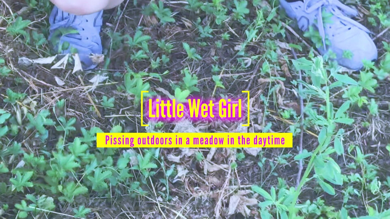 Little Wet Girl: Pissing outdoor in a meadow in the daytime