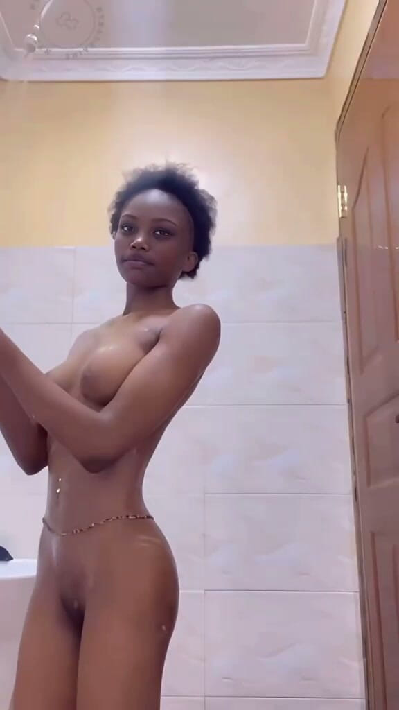 NyraDraine: African Teen Taking a Shower at Home