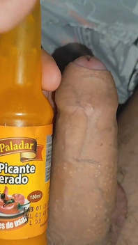 Straight Stepdaddy Filling His Dick with Hot Sauce.